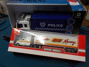 lot 57 image: New City Trucks Police Truck and De...
