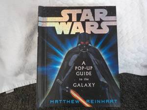 lot 89 image: Star Wars- A Pop Up Guide to the Ga...