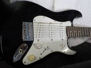 lot 101 image: Squier Mini Electric Guitar...