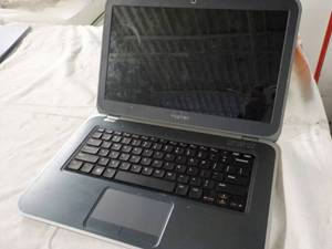 lot 165 image: Dell Inspiron- powers on needs cor...