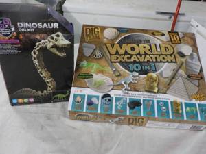 lot 177 image: New Dinosaur Dig Kit and Around the...