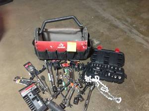 lot 98 image: Assorted mechanic tools in various conditions includes used husky bag