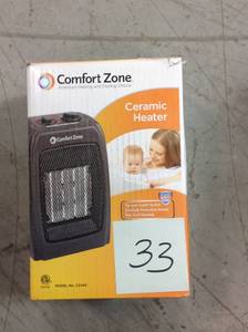 lot 33 image: Comfort Zone 7501,500-Watt Ceramic Electric Portable Heater with Thermostat and Fan in Blackin good condition