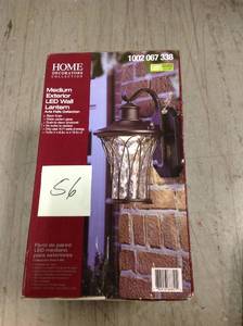 lot 56 image: Home Decorators Collection Black Outdoor LED Dusk to Dawn Wall Lantern Sconcein good condition