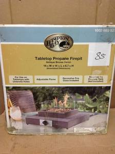 lot 85 image: Hampton Bay 8,000BTU Antique Bronze Portable Table Top Gas Fire Pit not used