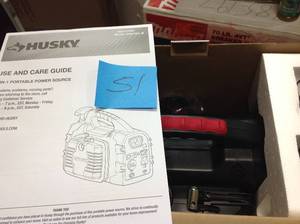 lot 51 image: Husky 8-in-1 12-Volt Power SourceJumpstarter in good condition