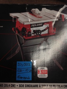 lot 103 image: Skil 15 Amp Corded Electric 10 in. Table Saw with Folding Stand in good conditions