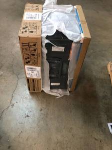 lot 115 image: Whirlpool 1.7 cu. ft. Over the Range Microwave in Stainless Steel with Electronic Touch Controls in good conditions