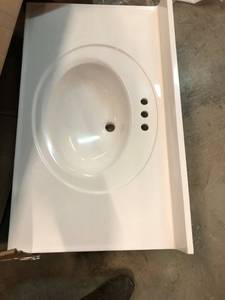 lot 119 image: Glacier Bay Newport 37 in. W x 22 in. D Cultured Marble Vanity Top in White with White Sink not used
