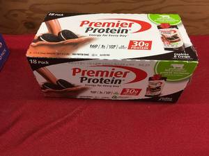lot 144 image: Premier Protein Cookies N Cream, Retail $26.99