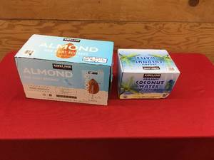 lot 3 image: Kirkland Signature Almond Non dairy Beverage & Kirkland Signature Organic Coconut Water, Retail $20.98