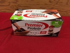 lot 59 image: Premier Protein Cookies N Cream, Retail $26.99