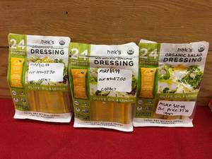 lot 92 image: Haks Organic Olive Oil & Lemon Salad Dressing, Retail $32.97