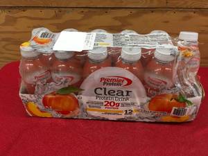 lot 128 image: Premier Protein Clear Protein Drink Peach, Retail $19.99