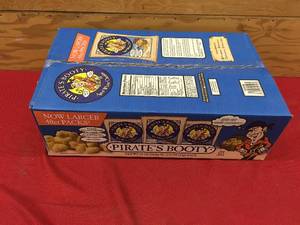lot 137 image: Pirates Booty Baked Rice & Corn Puffs, Retail $9.99