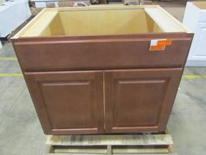 lot 108 image: Hampton Bay 36x34.5x24 in. Sink Base Kitchen Cabinet in Cognac KSB36-COG