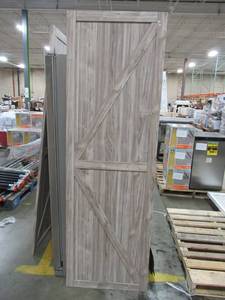 lot 264 image: Truporte 25 X 87 12 Iron Age Grey K Design Solid Core Interior Composite Barn Door Slab- Some Small Scratches.