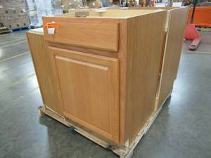 lot 297 image: (4) Diamond Now Portland Wheat Base and Wall Cabinets.