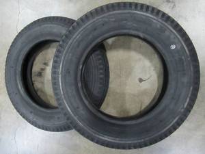 lot 327 image: Pair of Loadstar 480-12 K353 BIAS 780 lb. Load Capacity White with Stripe 12 in. Bias Tires - New
