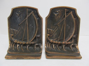 lot 31 image: Mid Century Sculptural Bronze Viking Ship Bookends