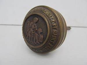lot 220 image: Antique SAINT PAUL Board of Education Embossed Solid Brass Door Knob