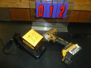 lot 12 image: Dewalt 20 volt Lithium Ion Impact Driver. As shown. SEE TERMS