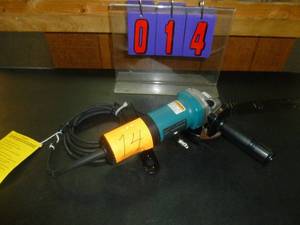 lot 14 image: Makita 4 12 Angle Grinder. Looks like new. As shown. SEE TERMS