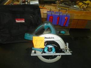 lot 17 image: Makita 36 volt Skilsaw with bag. No battery or cgarger included. As shown. SEE TERMS