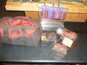 lot 23 image: Mac 20 volt 12 Impact with battery & charger. As shown. SEE TERMS