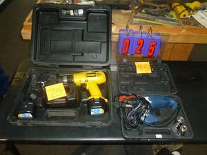 lot 25 image: Dewalt 9.6 volt 38 Drill with 2 batteries & chargers and a 12 volt corded Impact Driver. As shown. SEE TERMS