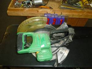 lot 27 image: Hitachi 10 Miter Saw with aluminum base. As shown. SEE TERMS