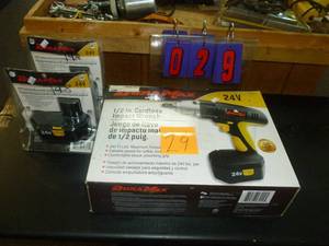 lot 29 image: Duramax 24 volt Impact Wrench with 2 extra batteries. As shown. SEE TERMS