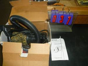 lot 37 image: Corvette 12 volt Car Vac with accessories. As shown. SEE TERMS