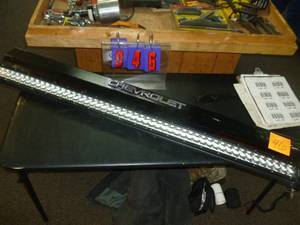 lot 46 image: Chevrolet Tailgate Cap & 4 LED Light Bar. As shown. SEE TERMS