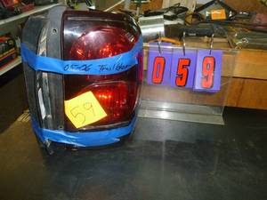 lot 59 image: Pair of Chevrolet Trailblazer Tail Lights for 2005 - 2006 Chevrolet Trailblazers. As shown. SEE TERMS
