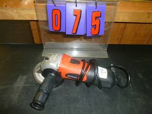 lot 75 image: Tool Shop 4 12 Angle Grinder. As shown. SEE TERMS