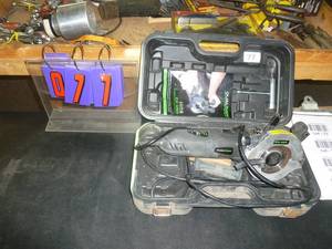 lot 77 image: Dual Saw Model # CS450 4 12 Saw. As shown. SEE TERMS