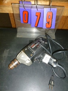 lot 79 image: Craftsman 110 volt 12 Reversible Drill. As shown. SEE TERMS