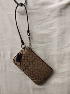 lot 49 image: Coach BeigeBrown Signature Wristlet