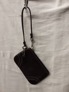 lot 53 image: Coach Brown Leather Wristlet
