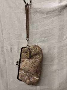 lot 64 image: Coach GoldSilver Metallic Signature Wristlet