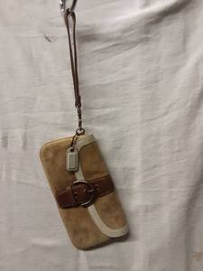 lot 68 image: Coach Camel Suede Wristlet