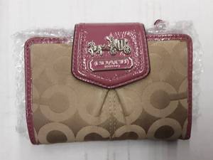 lot 70 image: Coach Tan Signature Wallet With Pink Trim & Inside
