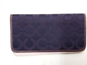 lot 74 image: Coach Purple Checkbook Cover-Lavender Inside