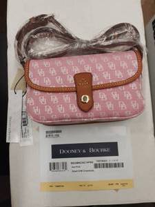 lot 82 image: Dooney & Bourke (New With Tags) Small Hot Pink Crossbody