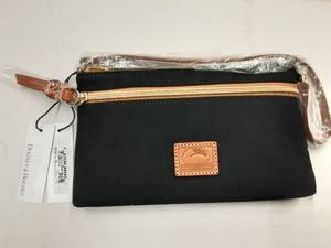 lot 85 image: Dooney & Bourke (New With Tags) Black Zip Clutch With Strap