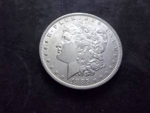 lot 9 image: 1885 O Morgan Silver Dollar