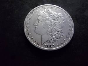 lot 16 image: 1889 O Morgan Silver Dollar