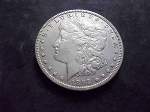 lot 19 image: 1892 O Morgan Silver Dollar