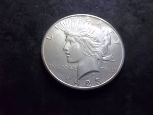 lot 32 image: 1923 S Peace Silver Dollar